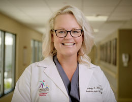 Dr. Courtney Martin