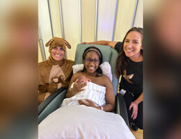 Mom in the NICU practicing kangaroo care with her baby