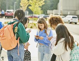 Medium wide shot middle school friends hanging out after school