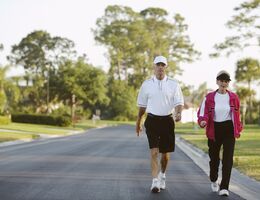Senior couple power walking