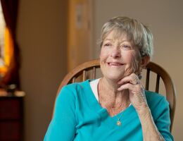 Woman sitting in chair