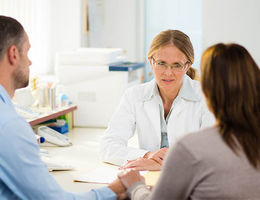 Doctor consulting with patient