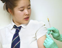 teenager receiving vaccine