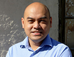 portrait of Huynh Cao, MD