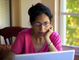 Woman looking at a laptop