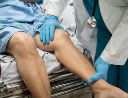 Person being prepped for knee surgery