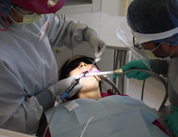 LLU dental students enact roles of operators and patients during the study's clinical trial