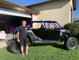Eric Nelson poses with his off-roading vehicle. Eric Nelson poses with his off-roading vehicle.