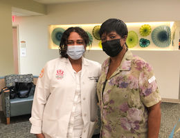 From left: Dr. Gayathri Nagaraj and Katie Smith with masks on