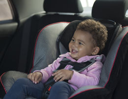 baby in car seat in car 