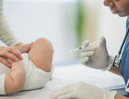 doctor vaccinating baby