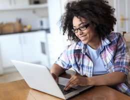 Young woman engaging in online learning