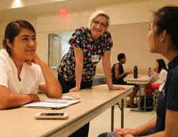 students sit at a table