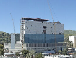 Tarps cover building framework