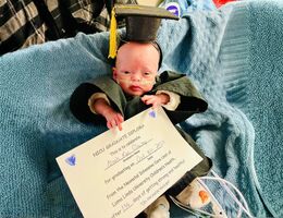 Noah graduating from NICU