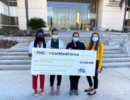 LLUH residents accept check from Cal Med Force