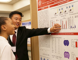 High school students present their research boards