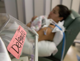 New mom Leticia Delgado holds her tiny baby, Emmarose Delgado, in the NICU at Loma Linda University Children’s Hospital.