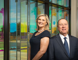 Jill and Barry Golden in front of the Indio Clinic.