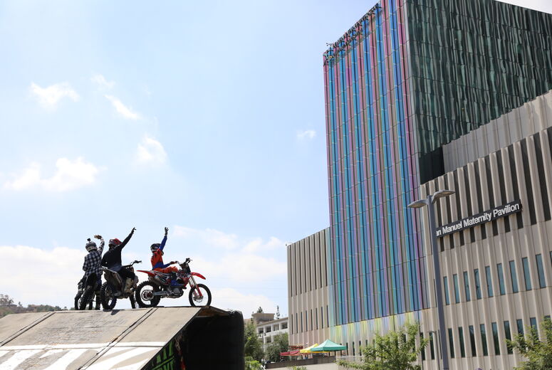 FMX riders at top of ramp