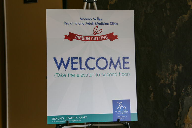 Ribbon cutting welcome sign