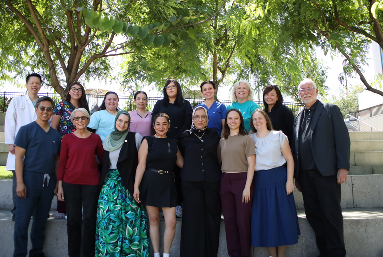 pediatric nephrology team poses for photo