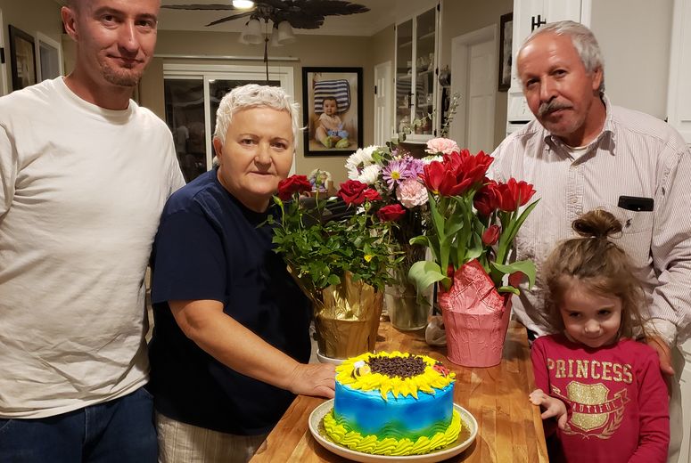 Catinean and her family celebrate a birthday
