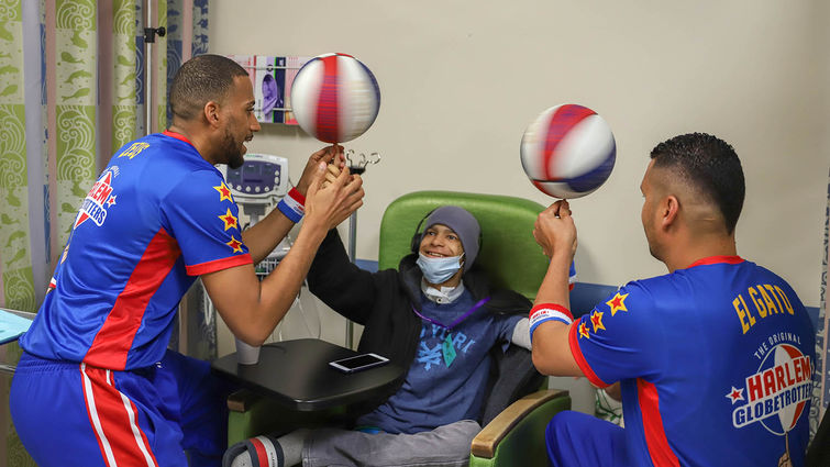 Members of the Harlem Globetrotters at the Loma Linda University Children's Hospital