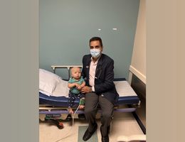 Dr. Hisham Abdel-Azim and young patient