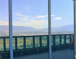 Workers complete installation of Conference Center glass wall panels