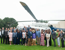LLUH Administration and staff stand in front of new helicopter