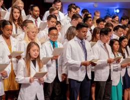 Photo Gallery: Loma Linda University School of Medicine White Coat Ceremony first-year medical students stand on the church steps to recite oath