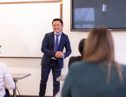 Dr De La Pena teaching in a Pharmacy classroom