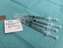 An arrangement of four flu vaccines