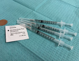 Advice about flu vaccine for people with cardiovascular concerns An arrangement of four flu vaccines