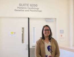Amanda Suplee stands in front of pediatric psychology unit