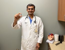 Dr. Harit Desai, associate director for the cardiac catheterization lab and structural heart intervention program at LLUMC – Murrieta, holds the world's smallest pacemaker.