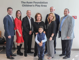 hospital administrators, city representatives, a the auen foundation cut ribbon