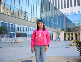 Ariatna standing outside hospital 