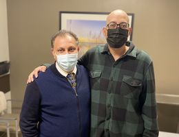 Dr. Dastjerdi (left) lead epilepsy patient Aaron Alejos (right) to live a seizure-free life. Aaron Alejos takes a photo with Dr. Dastjerdi