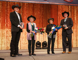 Dixie Watkins and Eloise Habekost stand on stage and being honored with 2024 Nancy B. Varner Lifetime Achievement Award