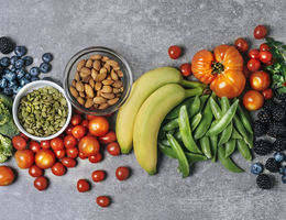 Assortment of colorful fruits, vegetables, and nuts.