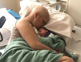 Miracle baby born after breast cancer patient underwent treatment during pregnancy Mother kissing newborn in hospital bed