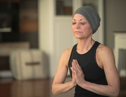 Coping with cancer during COVID-19 woman doing yoga