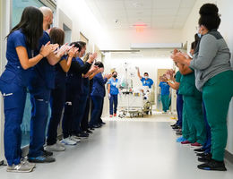 Employees cheer Employees cheer