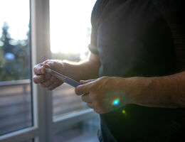 a man holds a injectable medicine 