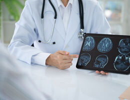 Doctor discussing Parkinson's treatment options