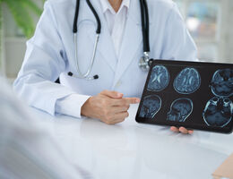 Doctor discussing Parkinson's treatment options