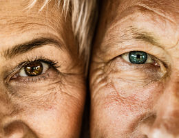 Close up shot of older couple's eyes