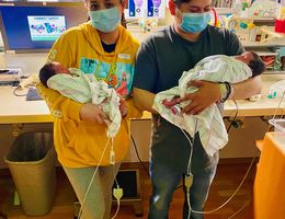 Woman faced with unexpected double diagnosis of pregnancy and blood cancer now a mother to healthy twins Violeta Andrade and her boyfriend, Marco Benitez, hold their newborn twins in the neonatal intensive care unit of the LLU Medical Center.